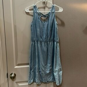 Blue dress with crocheting detail at bottom of dresss